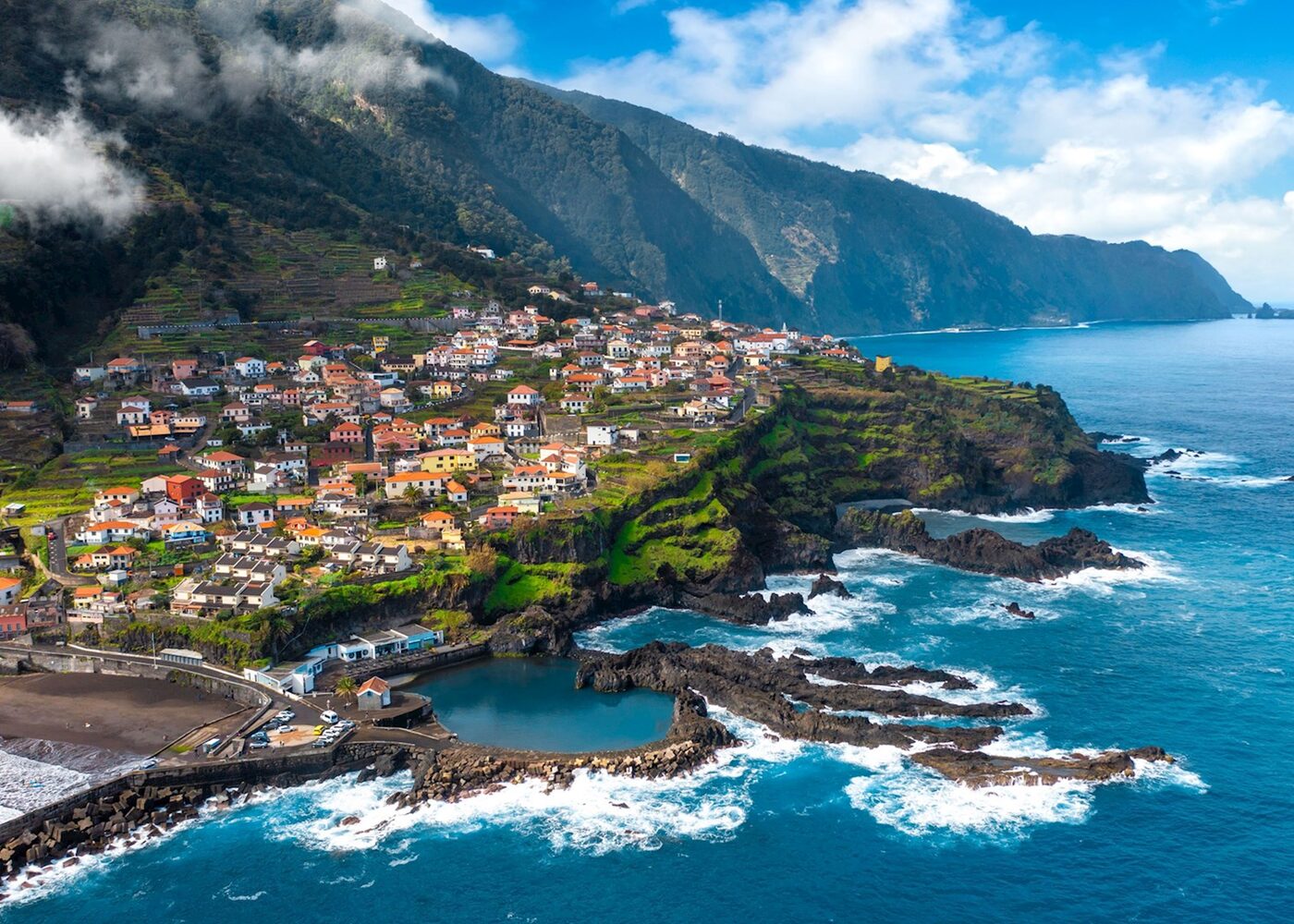 Village on Madeira's north coast with natural lava pools and cliffs